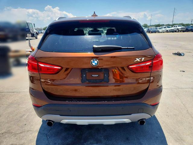 Photo 6 from auction – 2017 BMW X1 with VIN WBXHT3C33H5F76932