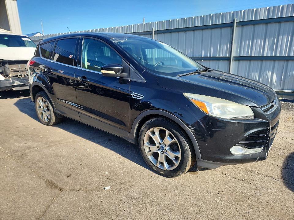 Photo 4 from auction – 2013 FORD ESCAPE with VIN 1FMCU0HX0DUB57220