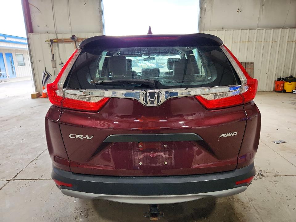 Photo 6 from auction – 2018 HONDA CR-V with VIN 2HKRW6H30JH200663