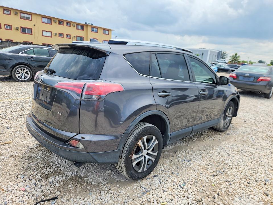 Photo 3 from auction – 2018 TOYOTA RAV4 with VIN JTMZFREV2JJ207306