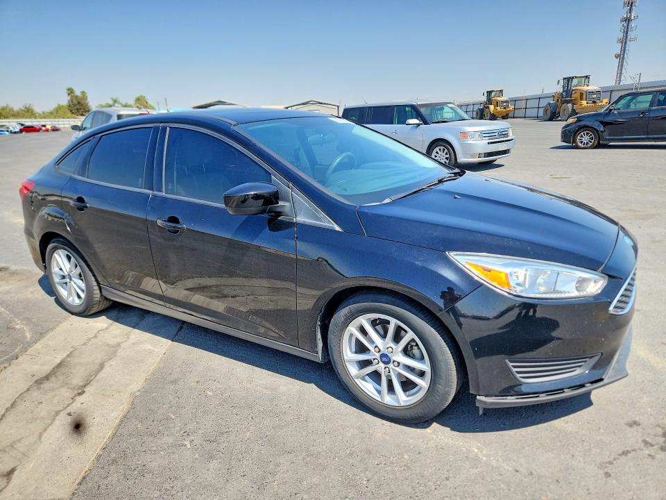 Photo 4 from auction – 2018 FORD FOCUS with VIN 1FADP3F23JL250605