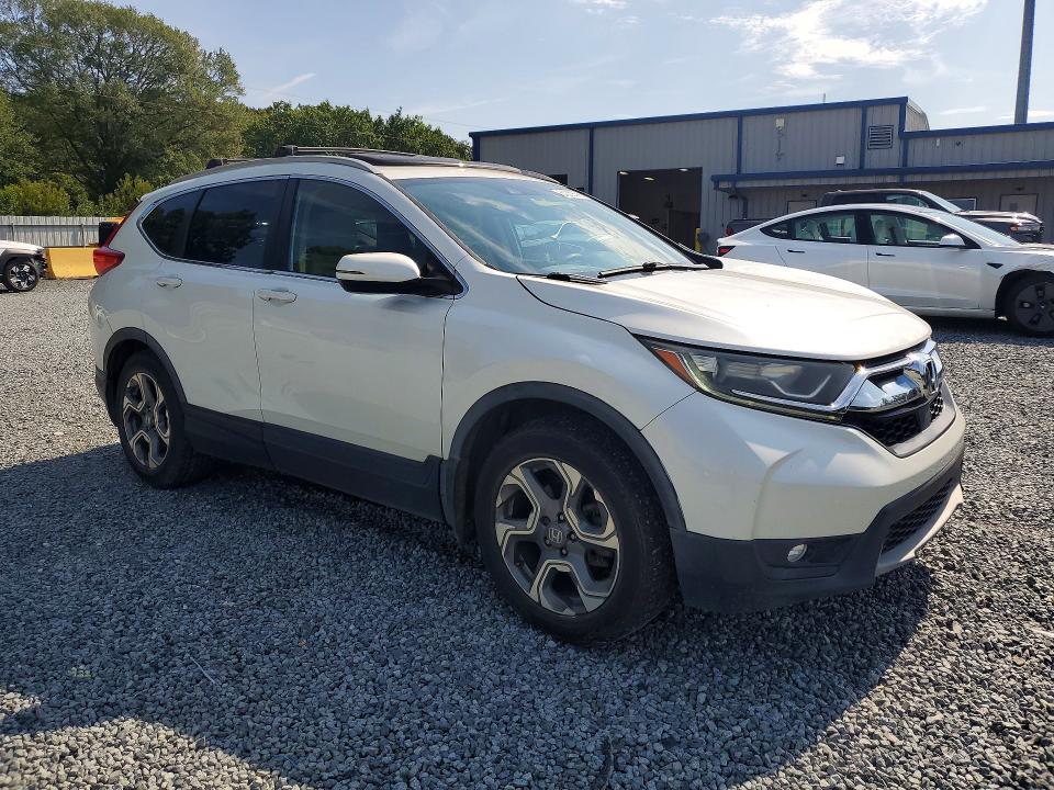 Photo 4 from auction – 2017 HONDA CR-V with VIN 2HKRW1H58HH507643