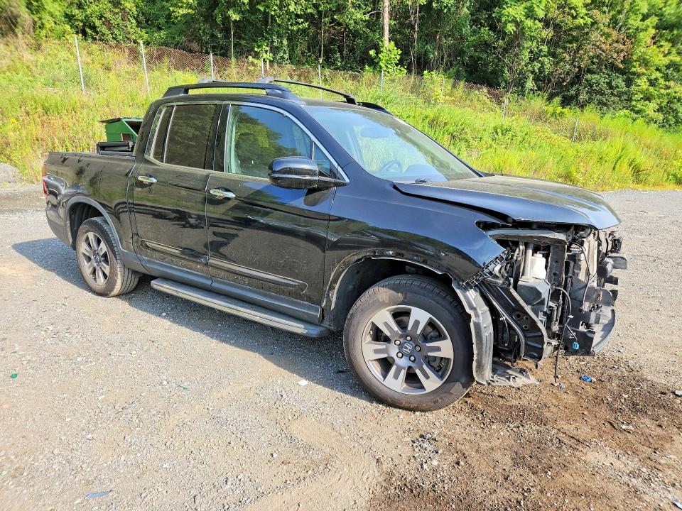 Photo 4 from auction – 2018 HONDA RIDGELINE with VIN 5FPYK3F74JB004243