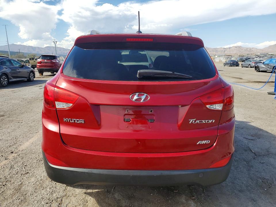 Photo 6 from auction – 2012 HYUNDAI TUCSON with VIN KM8JUCAC5CU511179