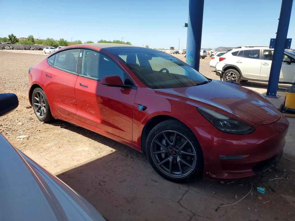 Photo 4 from auction – 2022 TESLA MODEL 3 with VIN 5YJ3E1EB5NF158065