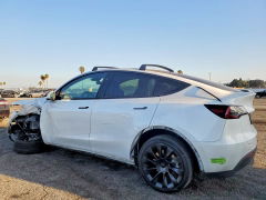 Photo 2 from auction – 2023 TESLA MODEL Y with VIN 7SAYGDEE9PF848774