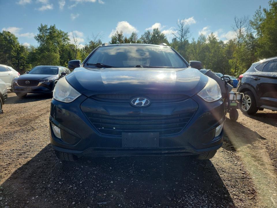 Photo 5 from auction – 2011 HYUNDAI TUCSON with VIN KM8JU3AC2BU314050