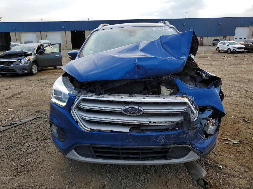 Photo 5 from auction – 2017 FORD ESCAPE with VIN 1FMCU0J90HUA60309