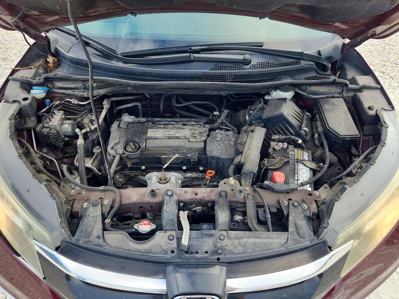 Photo 11 from auction – 2015 HONDA CR-V with VIN 2HKRM3H75FH520656