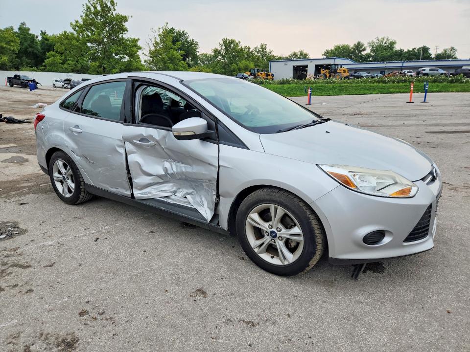 Photo 4 from auction – 2014 FORD FOCUS with VIN 1FADP3F27EL440803