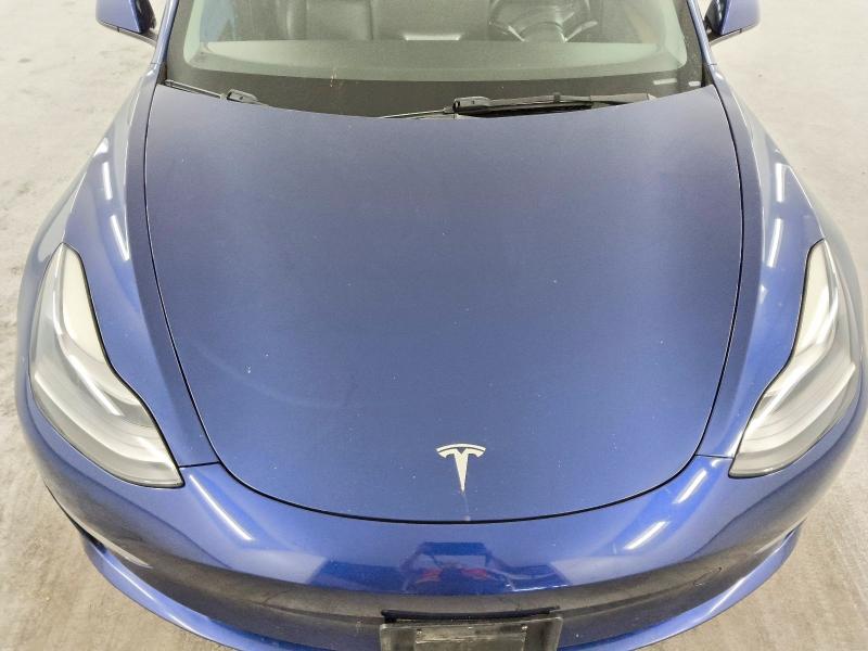 Photo 11 from auction – 2022 TESLA MODEL 3 with VIN 5YJ3E1EA7NF189602