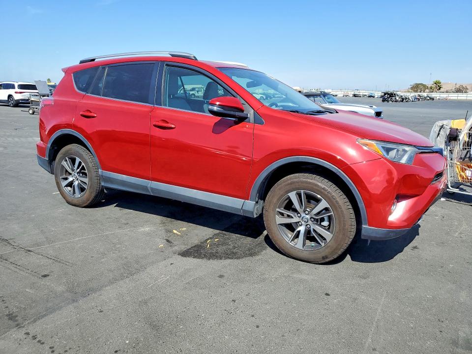 Photo 4 from auction – 2016 TOYOTA RAV4 with VIN 2T3RFREV4GW441540