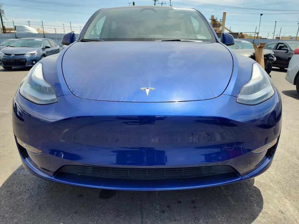 Photo 5 from auction – 2023 TESLA MODEL Y with VIN 7SAYGDED7PF964885