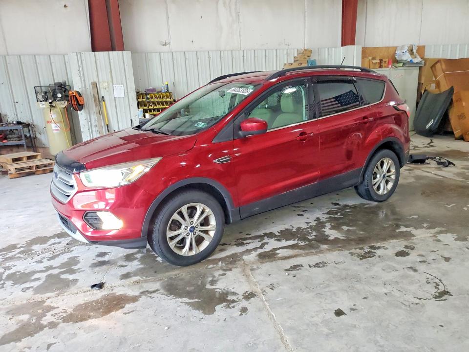 FORD ESCAPE 2018 with VIN 1FMCU9HD3JUA82017 - Photo from auction