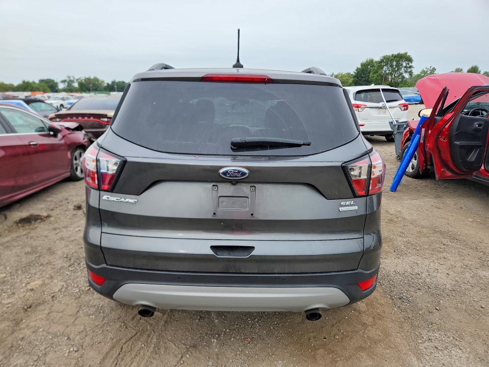 Photo 6 from auction – 2018 FORD ESCAPE with VIN 1FMCU0HD9JUA90795