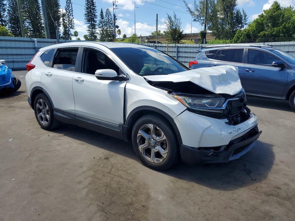 Photo 4 from auction – 2017 HONDA CR-V with VIN 5J6RW1H52HL017527