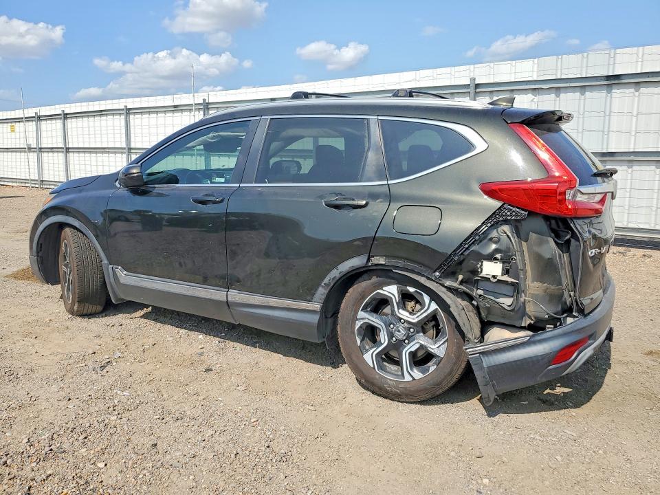 Photo 2 from auction – 2018 HONDA CR-V with VIN 7FARW1H99JE017417