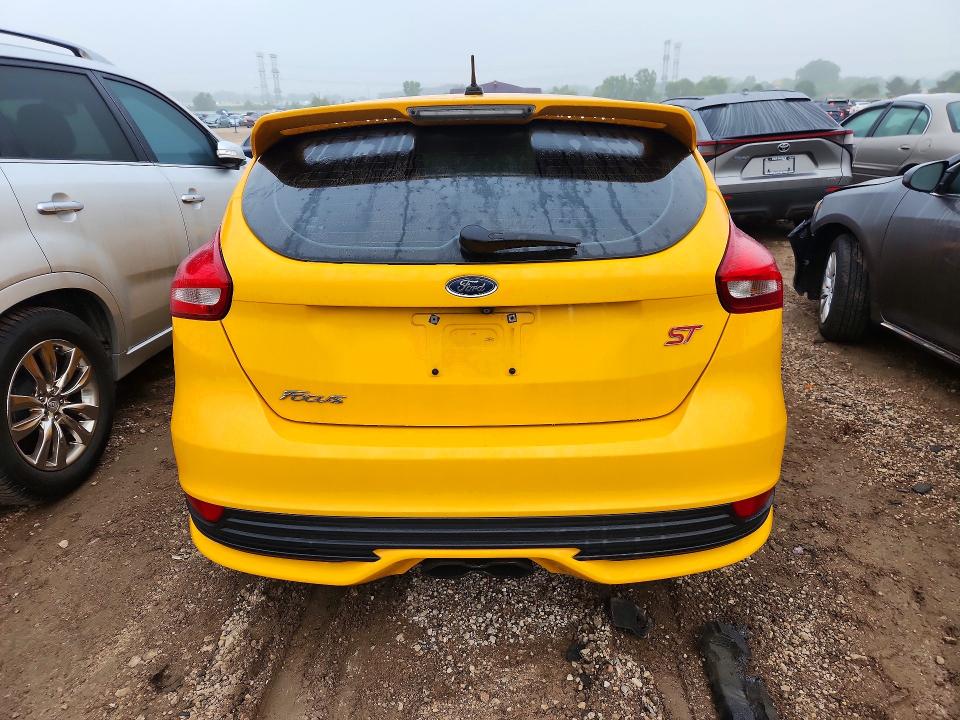 Photo 6 from auction – 2015 FORD FOCUS with VIN 1FADP3L9XFL324515