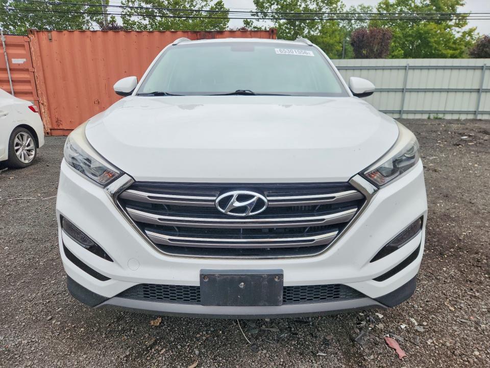 Photo 5 from auction – 2016 HYUNDAI TUCSON with VIN KM8J3CA26GU238463