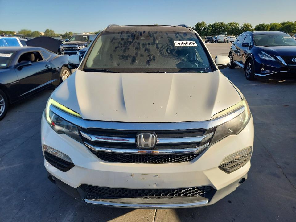 Photo 5 from auction – 2017 HONDA PILOT with VIN 5FNYF6H92HB044313
