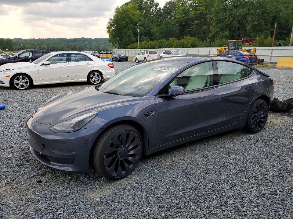TESLA MODEL 3 2022 with VIN 5YJ3E1EC9NF268027 - Photo from auction