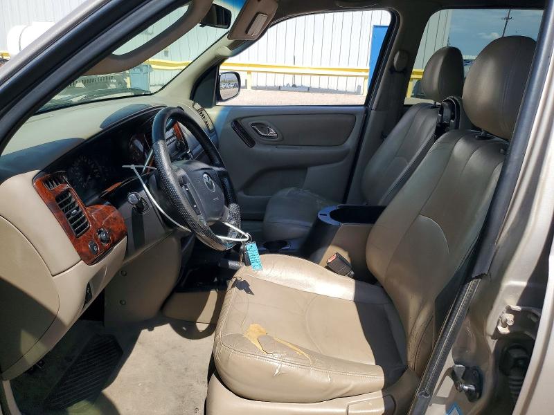 Photo 7 from auction – 2002 MAZDA TRIBUTE with VIN 4F2YU08142KM22591