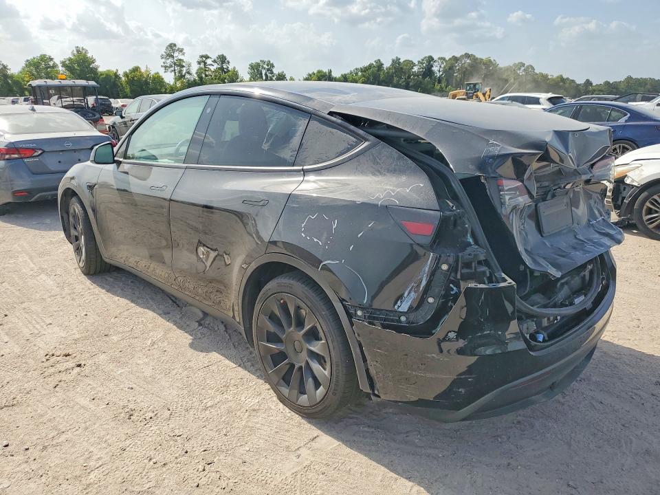 Photo 2 from auction – 2022 TESLA MODEL Y with VIN 7SAYGAEE6NF464656