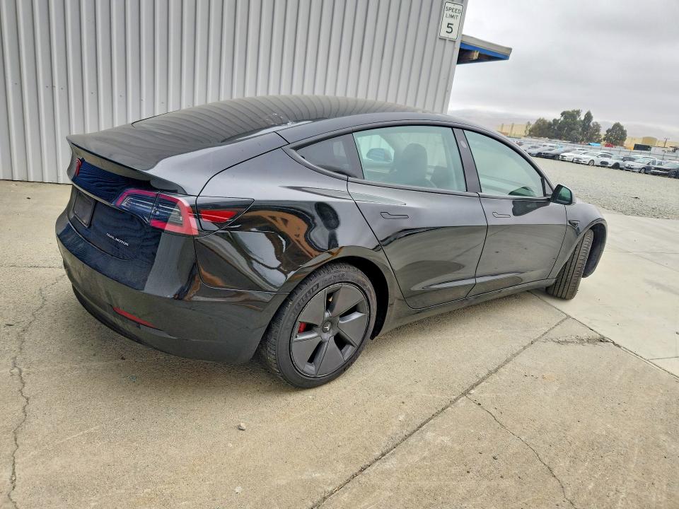 Снимка 3 от търг – 2022 TESLA MODEL 3 с VIN 5YJ3E1EB3NF258696