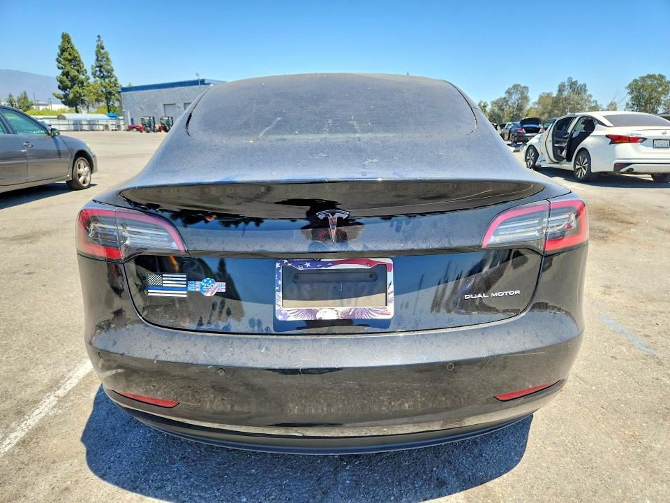 Photo 6 from auction – 2021 TESLA MODEL 3 with VIN 5YJ3E1EB7MF060170