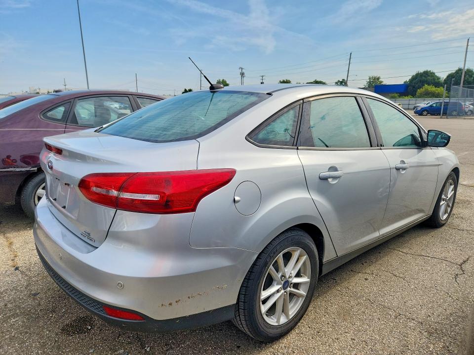 Photo 3 from auction – 2015 FORD FOCUS with VIN 1FADP3F23FL280498