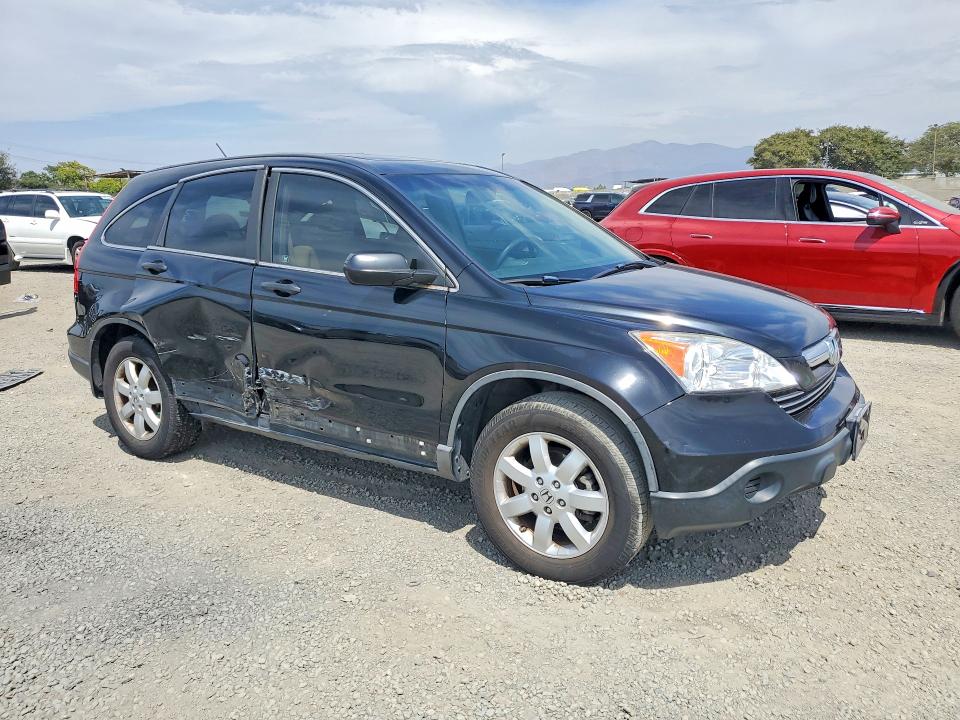 Photo 4 from auction – 2009 HONDA CR-V with VIN 5J6RE38579L033416