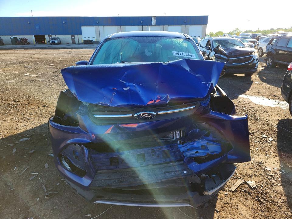 Photo 5 from auction – 2016 FORD ESCAPE with VIN 1FMCU0GX1GUA55513