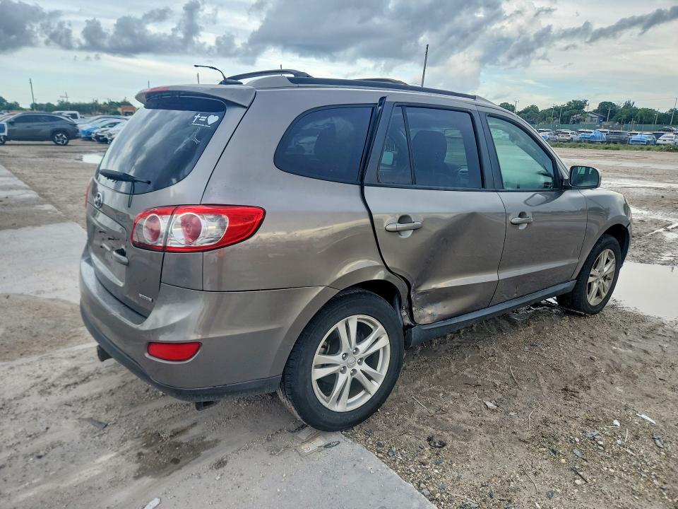 Photo 3 from auction – 2012 HYUNDAI SANTA FE with VIN 5XYZHDAG4CG139534