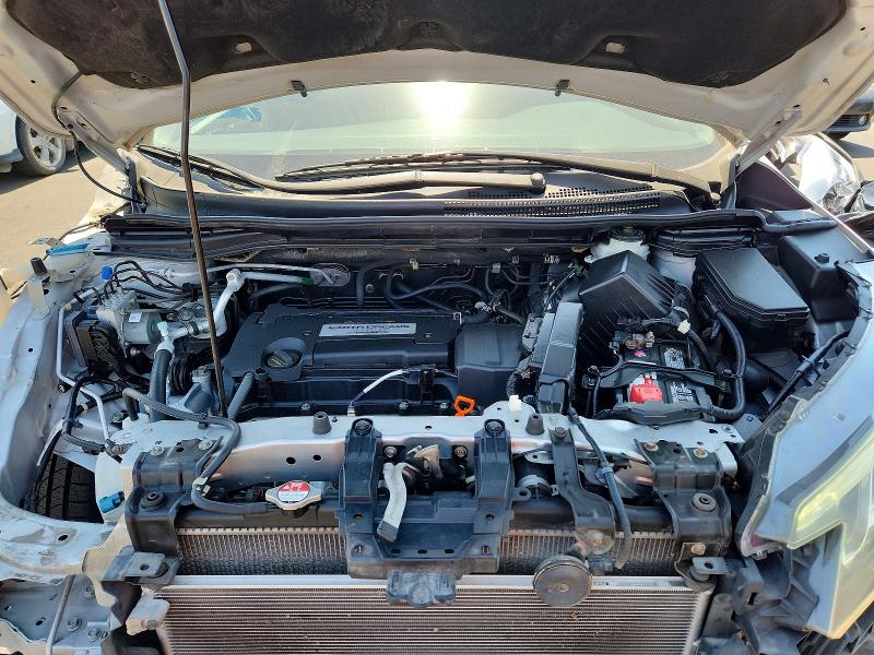 Photo 12 from auction – 2015 HONDA CR-V with VIN 2HKRM3H77FH518987
