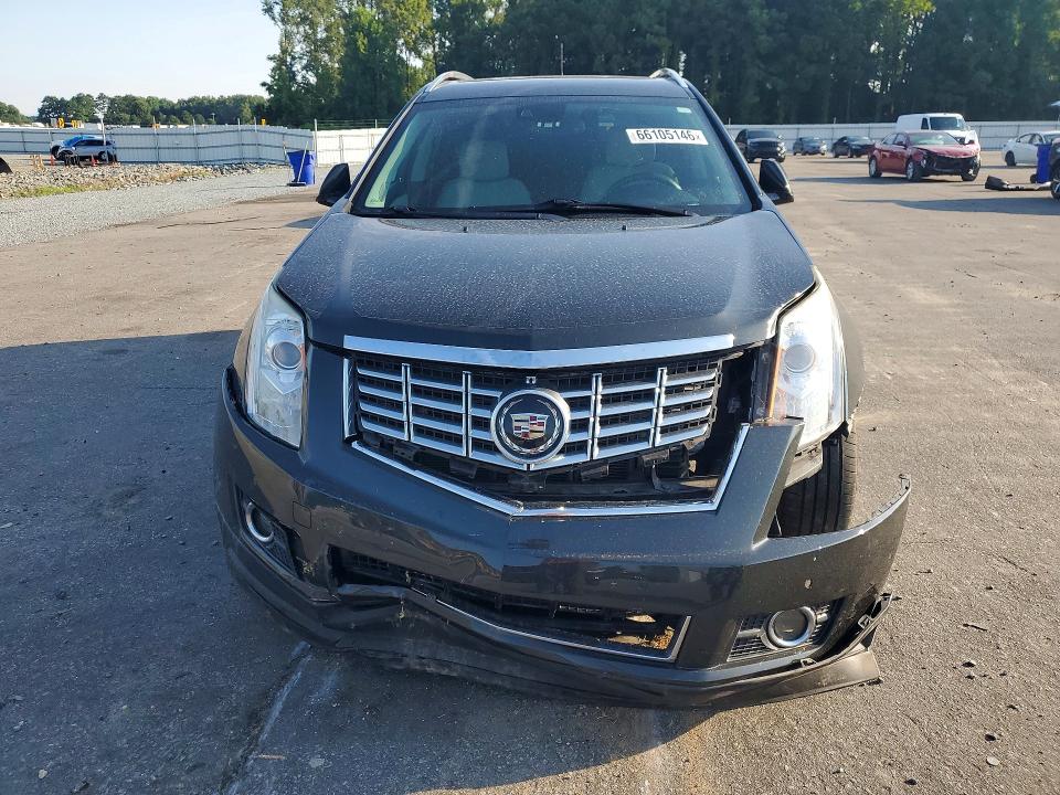 Photo 5 from auction – 2015 CADILLAC SRX with VIN 3GYFNDE39FS556597