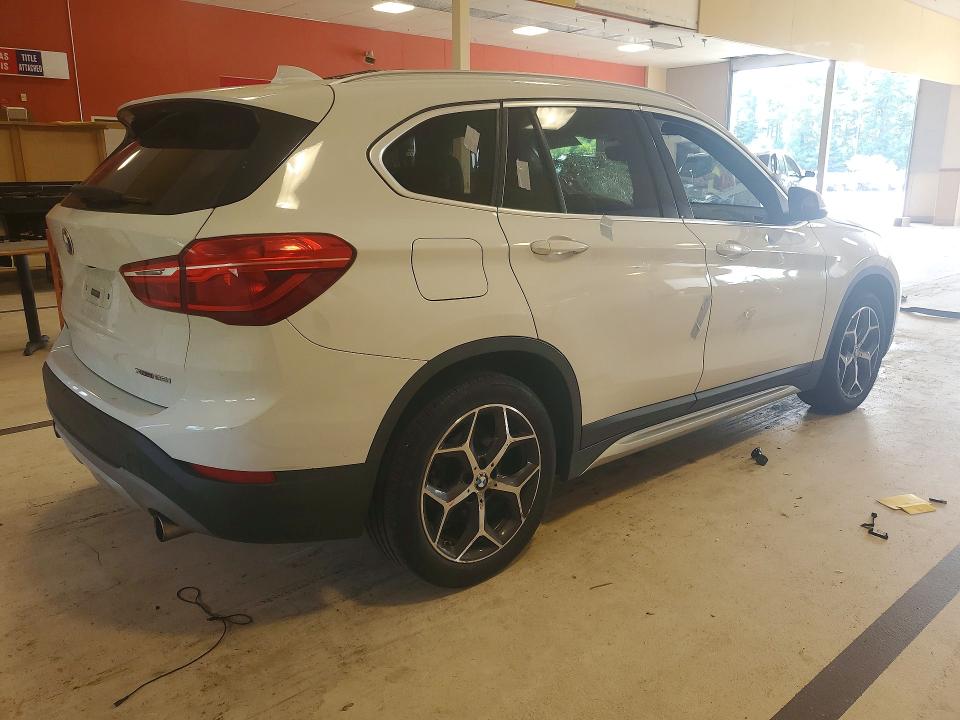 Photo 3 from auction – 2018 BMW X1 with VIN WBXHT3C30J5L27121