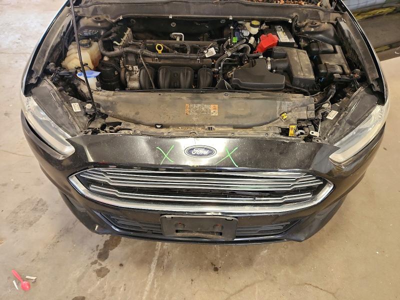 Photo 11 from auction – 2016 FORD FUSION with VIN 3FA6P0H7XGR365471