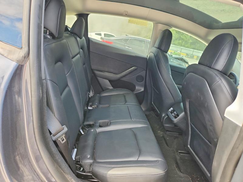 Photo 11 from auction – 2023 TESLA MODEL Y with VIN 7SAYGDEE1PF597748