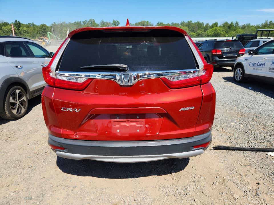 Photo 6 from auction – 2017 HONDA CR-V with VIN 2HKRW2H85HH603147