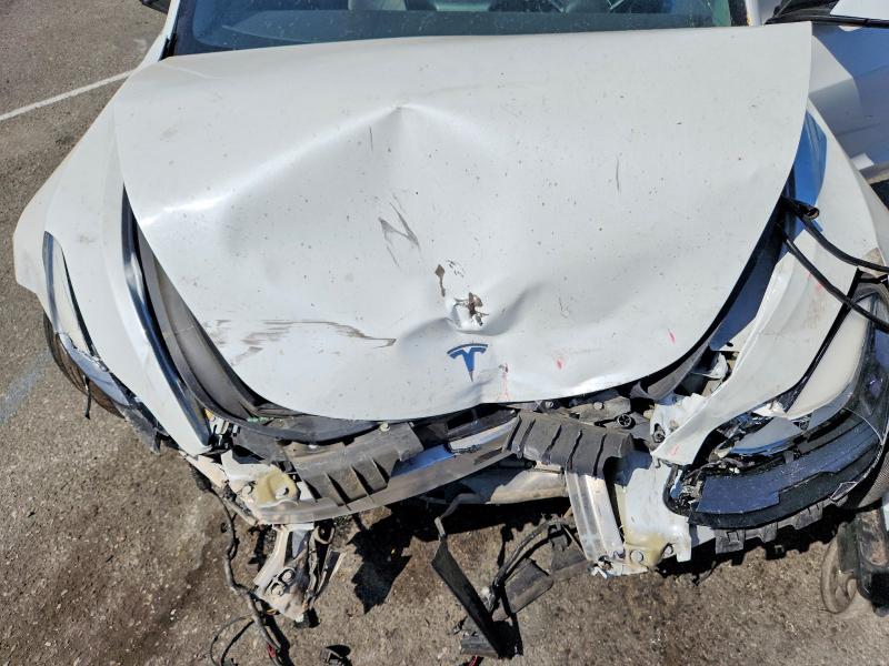 Photo 11 from auction – 2022 TESLA MODEL 3 with VIN 5YJ3E1EB8NF274702