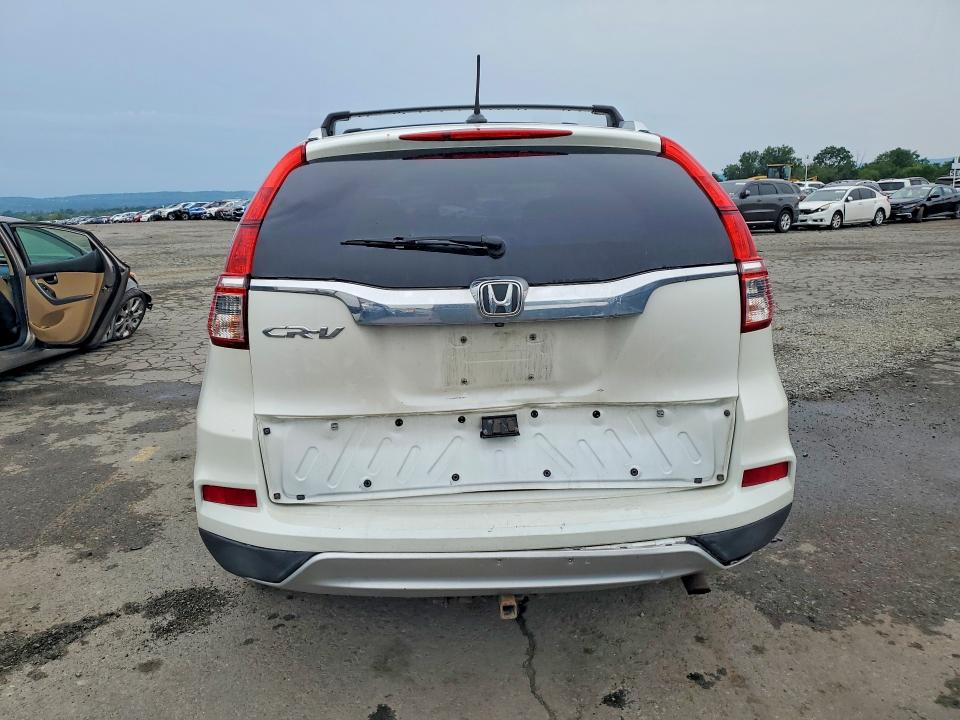 Photo 6 from auction – 2016 HONDA CR-V with VIN 5J6RM3H73GL018946