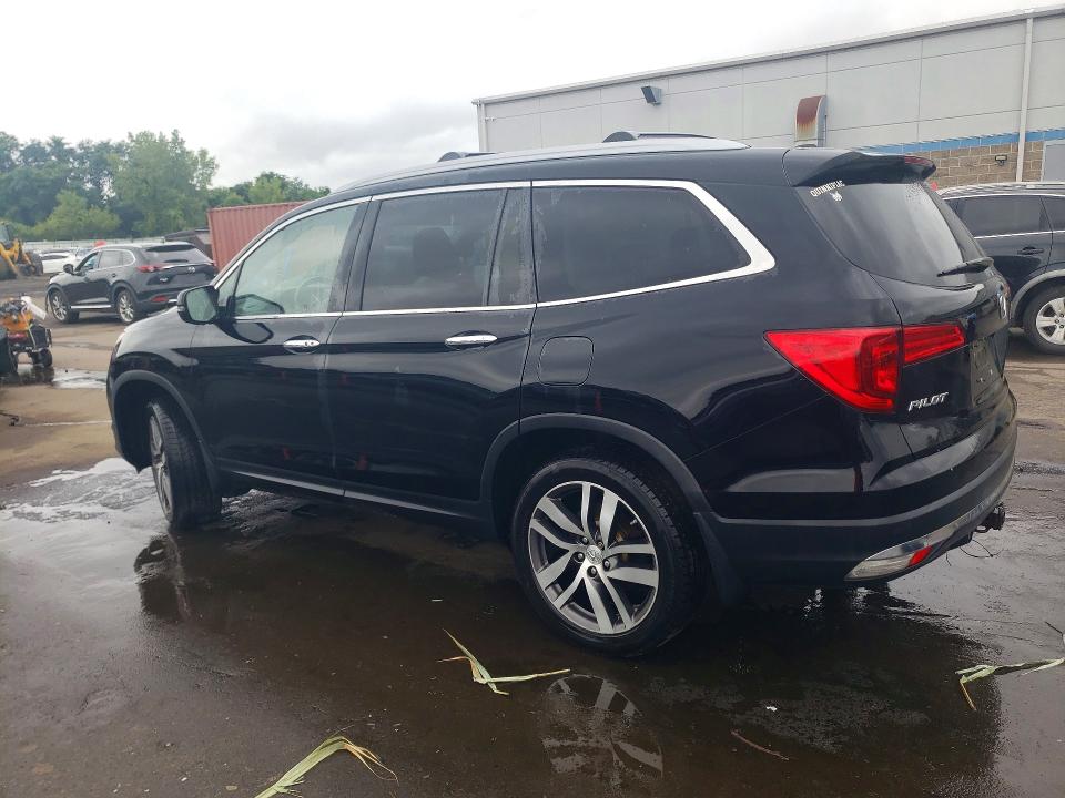 Photo 2 from auction – 2016 HONDA PILOT with VIN 5FNYF6H98GB123015