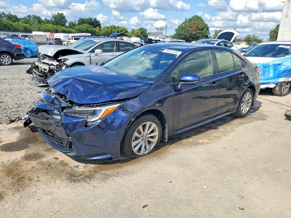 TOYOTA COROLLA HYBRID 2025 with VIN JTDBCMFE1S3090657 - Photo from auction
