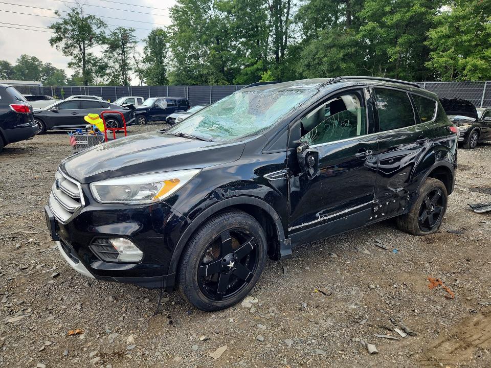 FORD ESCAPE 2018 with VIN 1FMCU9GD9JUC40703 - Photo from auction