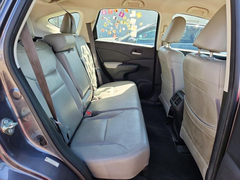 Photo 11 from auction – 2015 HONDA CR-V with VIN 2HKRM3H35FH504700