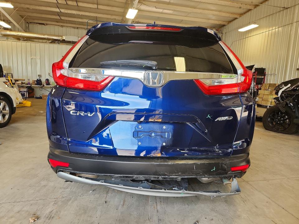 Photo 6 from auction – 2019 HONDA CR-V with VIN 7FARW2H59KE034741