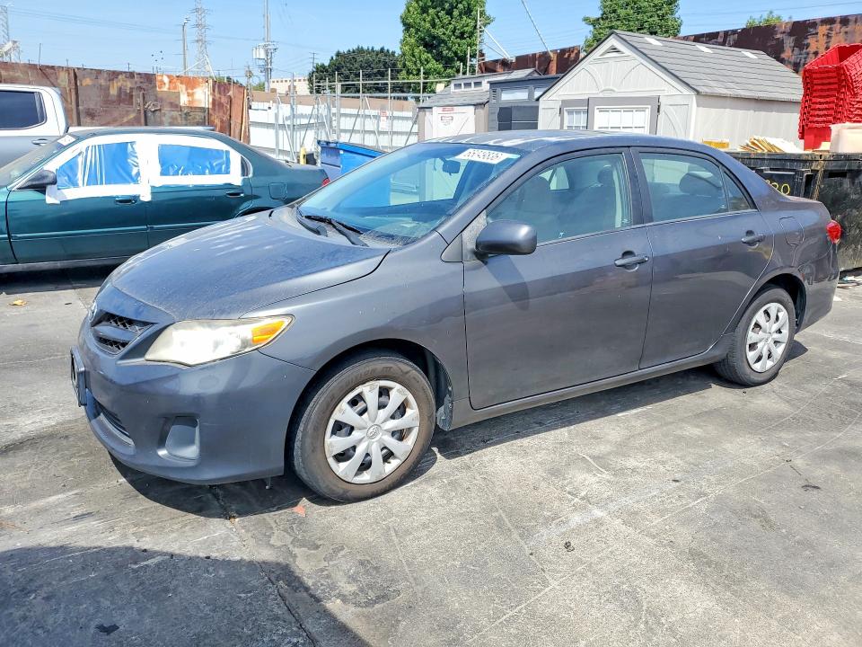 TOYOTA COROLLA 2011 with VIN 2T1BU4EEXBC693970 - Photo from auction