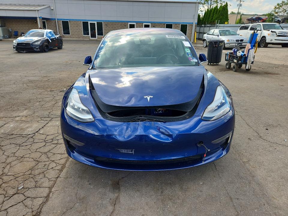 Photo 5 from auction – 2018 TESLA MODEL 3 with VIN 5YJ3E1EA8JF032168