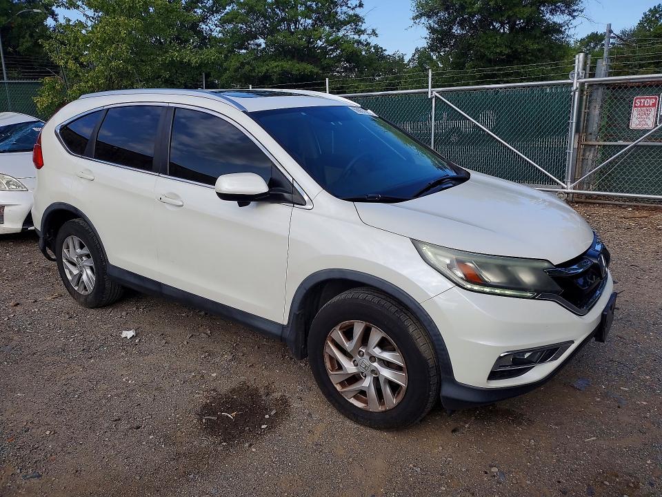 Photo 4 from auction – 2015 HONDA CR-V with VIN 5J6RM4H77FL115281