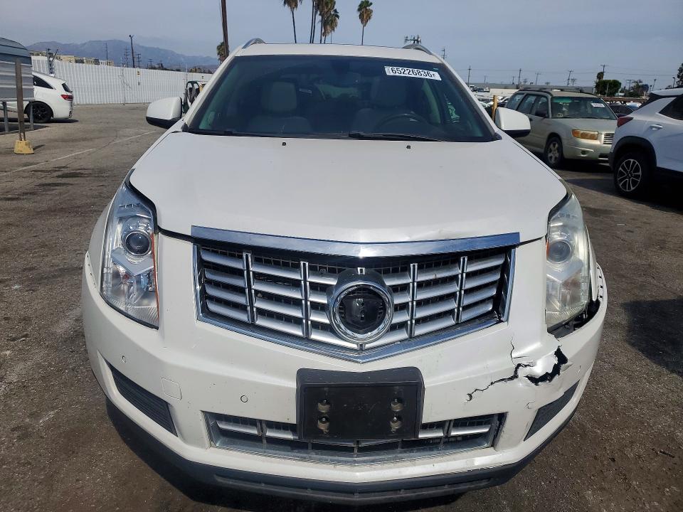 Photo 5 from auction – 2014 CADILLAC SRX with VIN 3GYFNBE31ES635653